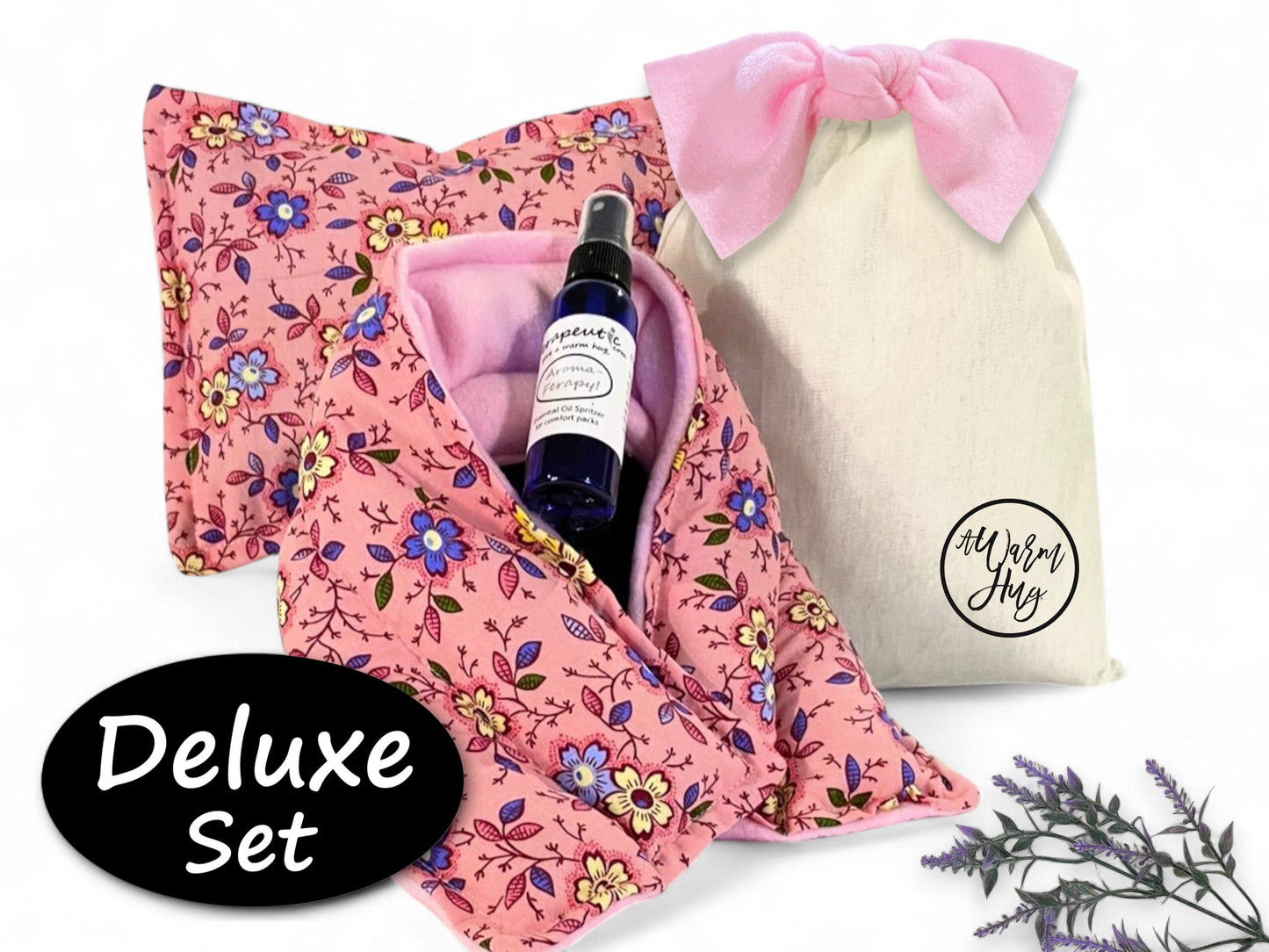 Deluxe warm hug gift set with floral fabric, bottle, and cotton gift bag on a white background