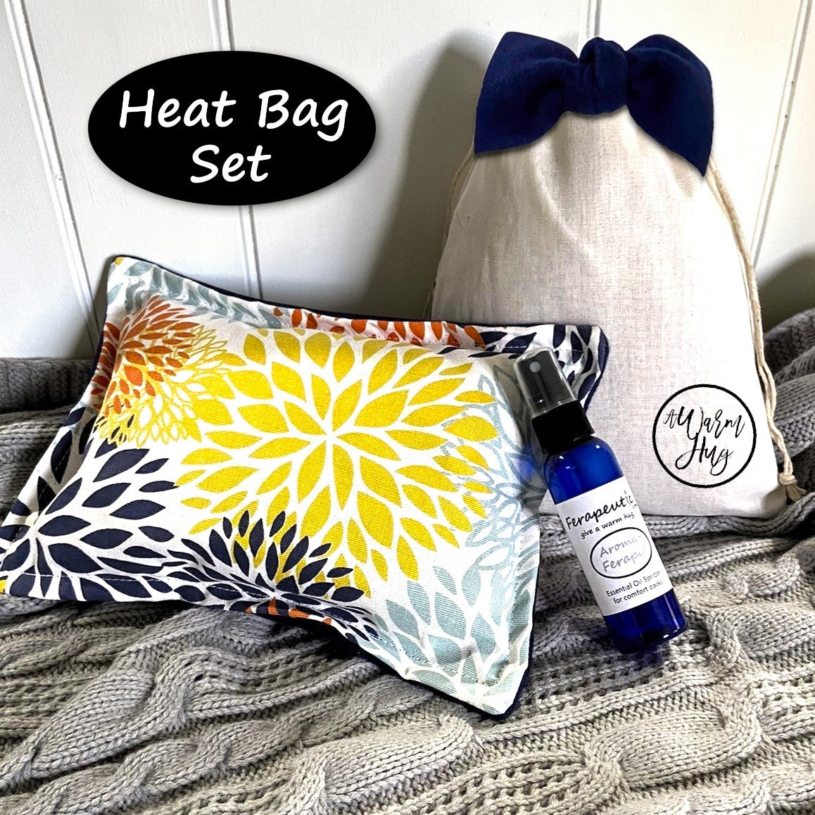 Heat bag set with a bottle labeled 'Aromatherapy' on a textured surface.
