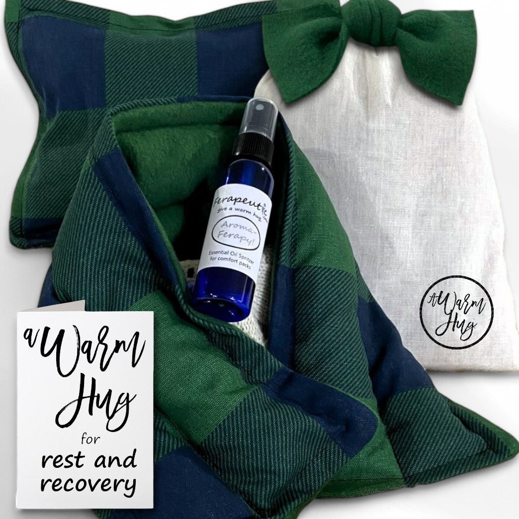 feel better hot or cold pack gift set with herbal aromatherapy, packaged in a warm hug gift bag and beautiful large green bow
